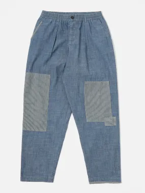 Universal Works Patched Pleated Track Pant in Indigo Chambray/Hickory Stripe Denim